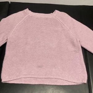 Long sleeved pink sweater